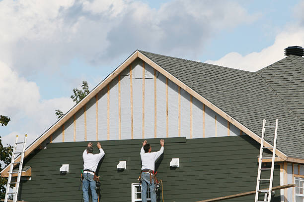 Professional Siding technician working in Elmhurst, IL